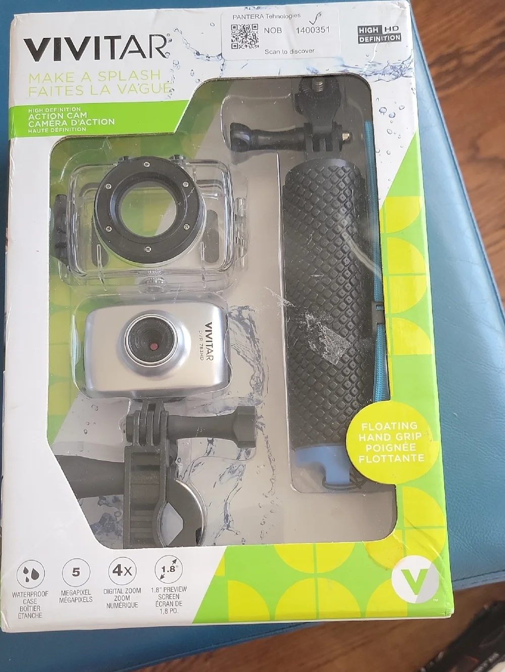 Silver Action Camera with Blue-Accented Floating Hand Grip